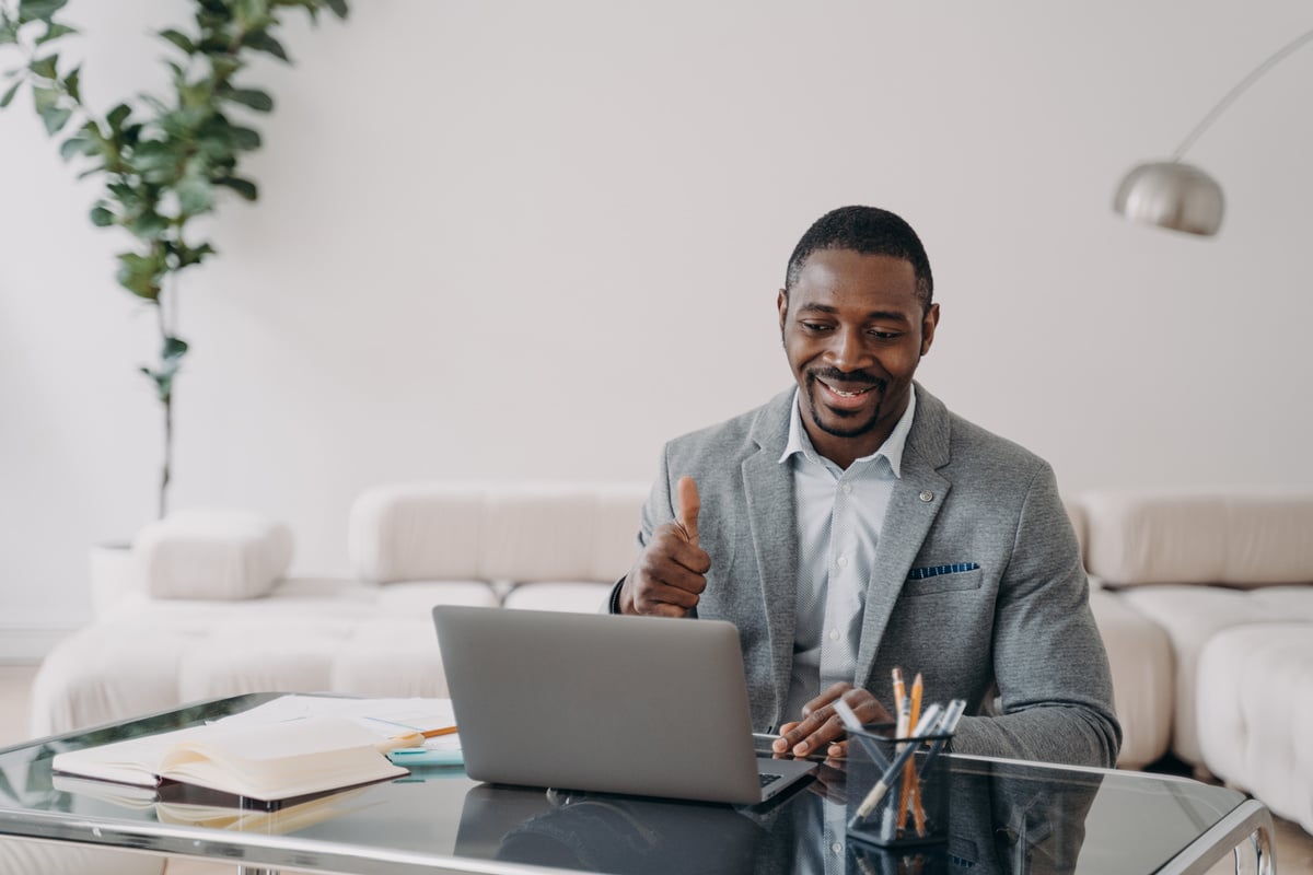 Man has online conversation or consultation on laptop. Teach